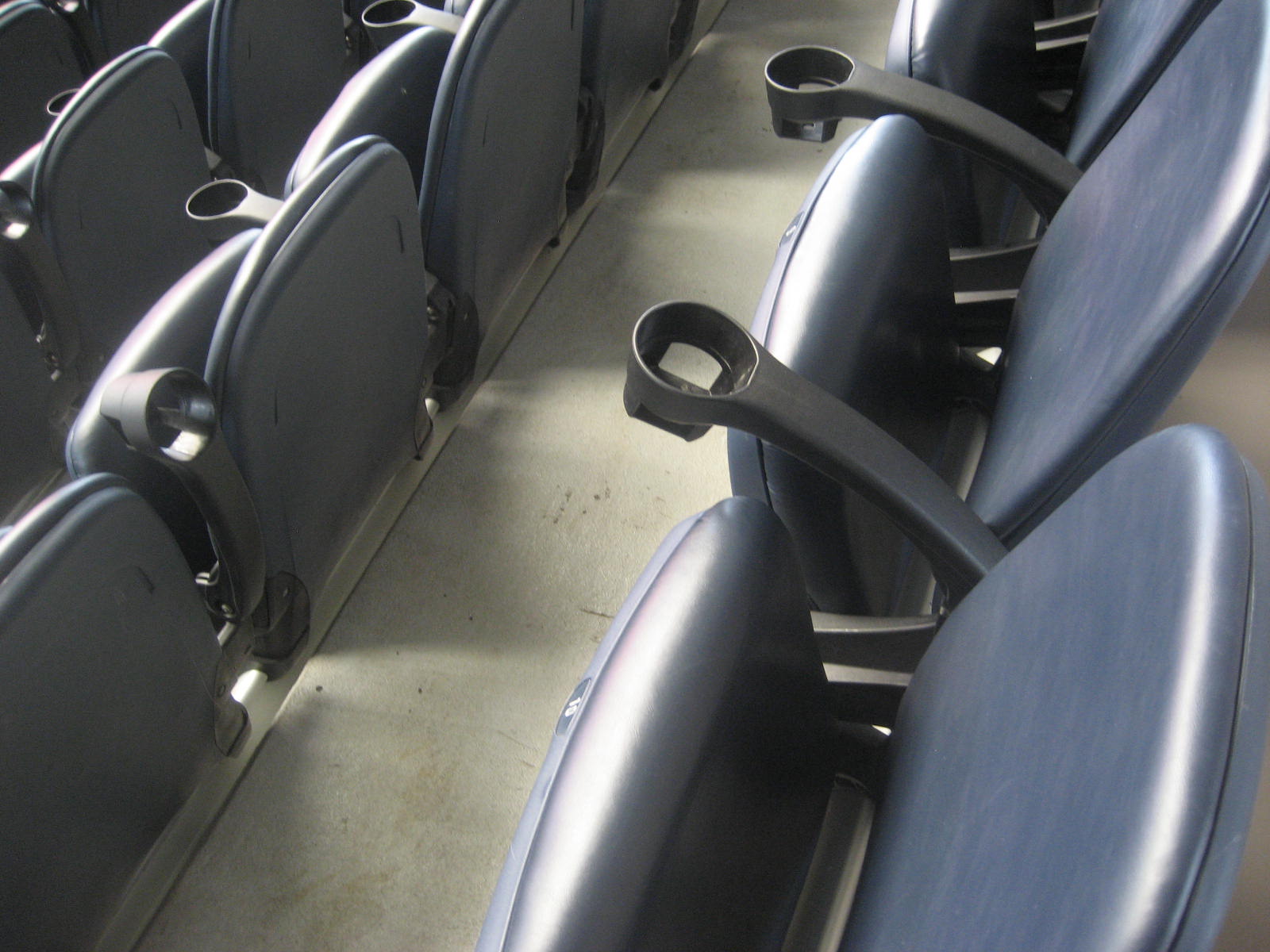 Padded seats with cupholders